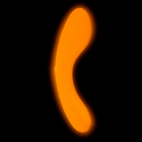 Glow-in-the-dark Mini Swan Wand in orange by Swan, featuring a small swan shape and luminous, playful design for kids.